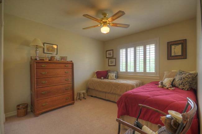 Comfortable guest bedroom in luxury custom home Kerrville Texas