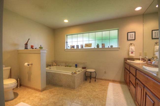 Spa-like master en-suite bathroom with premium finishes in luxury home