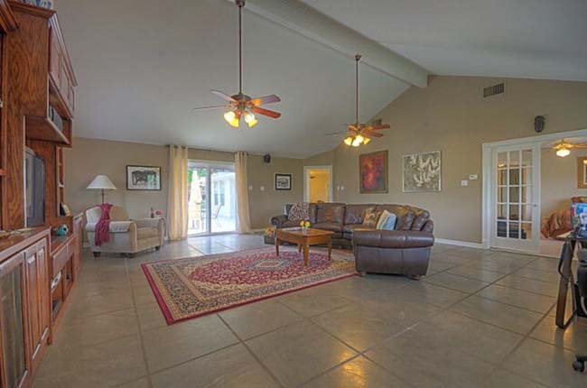 Great room with custom built-in entertainment center in executive home
